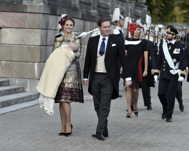 [09:47] Sweden's Prince Madeleine (L) holds her newly baptized son Prince Nicolas as she leaves the church with her husband Chris O'Neill 