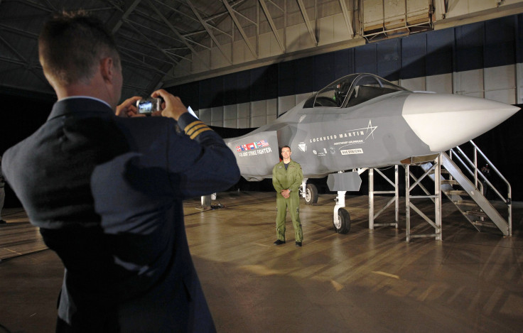 A Canadian service member next to an F-35. 