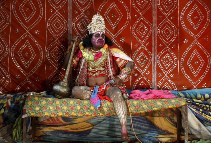 A man dressed as the Hindu monkey god Hanuman