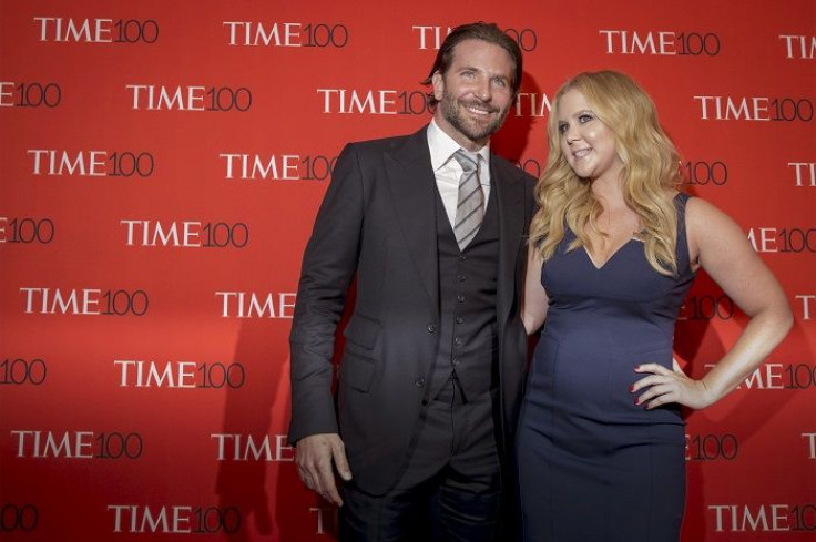  Bradley Cooper (L) and Amy Schumer