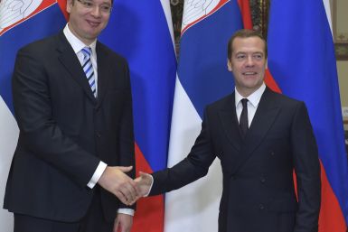 Serbian and Russian Prime Ministers shake hands