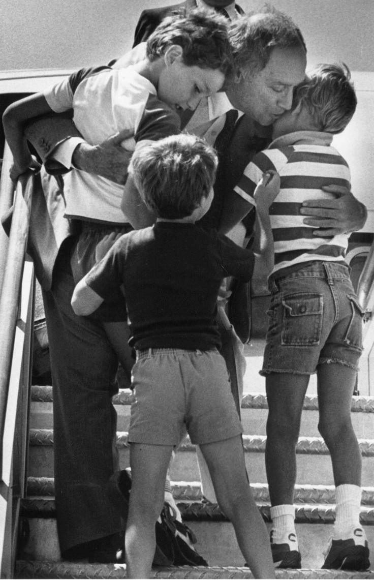Former Canadian Prime Minister Pierre Trudeau greets his children