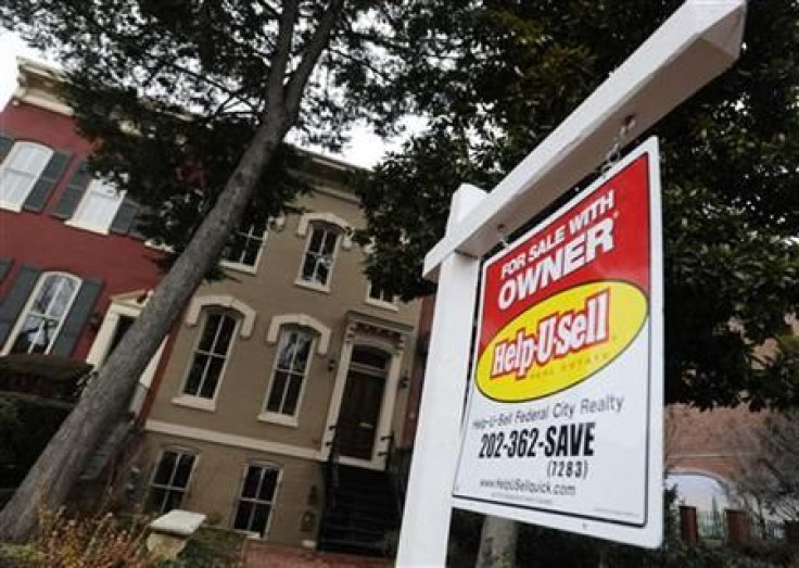 A sign marks a house for sale by the owner in the Capitol Hill neighborhood in Washington