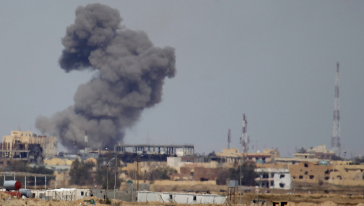 Smoke rises above Tikrit, Iraq after a U.S. airstrike against the Islamic State group.