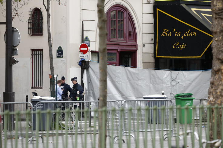 A sheet obscures the front of the stricken theater