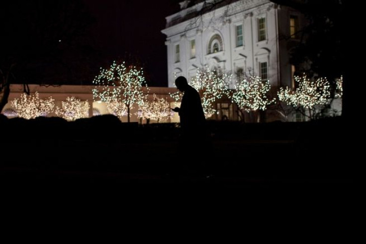 Obama silhouetted walking t the oval office dec 2010 -- pete souza