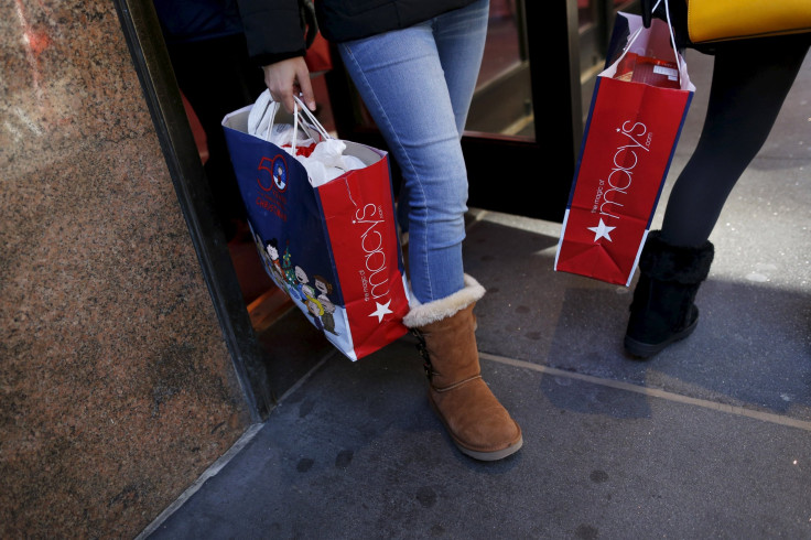 Shoppers exit Macy's on 34th St. in Herald Square in the Manhattan borough of New York