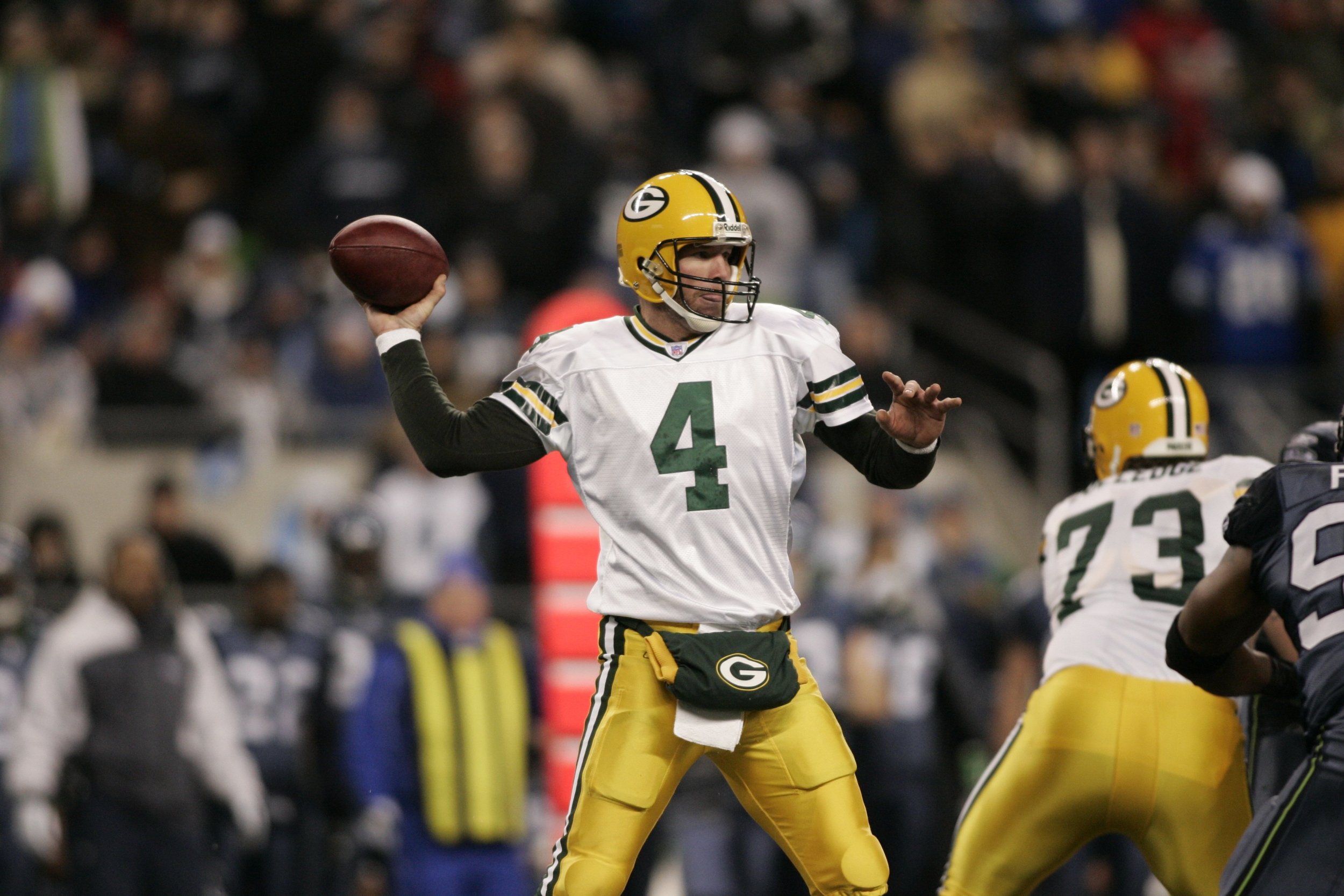 Brett Favre & Bart Starr at Favre's number retirement ceremony at