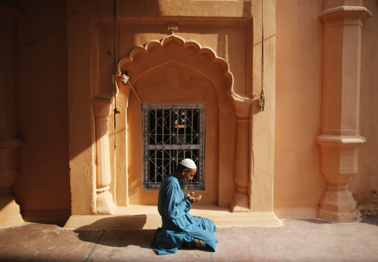 Man prays in Bangladesh mosque