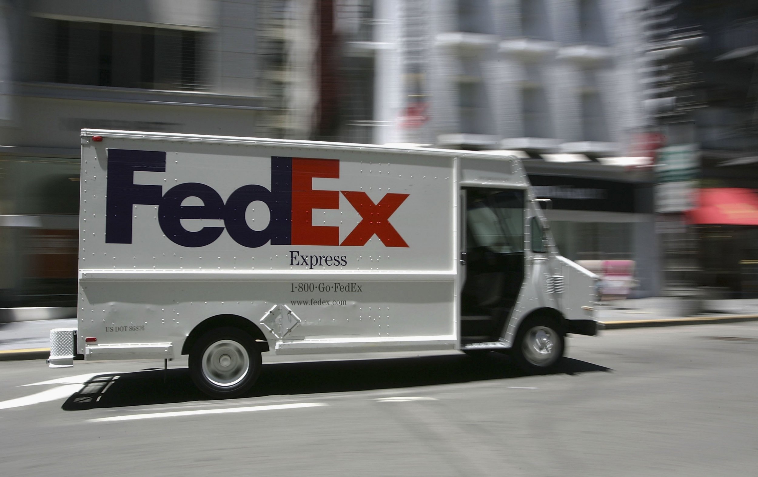 CCTV Captures FedEx Driver Chucking Package Onto Porch Without Leaving Truck