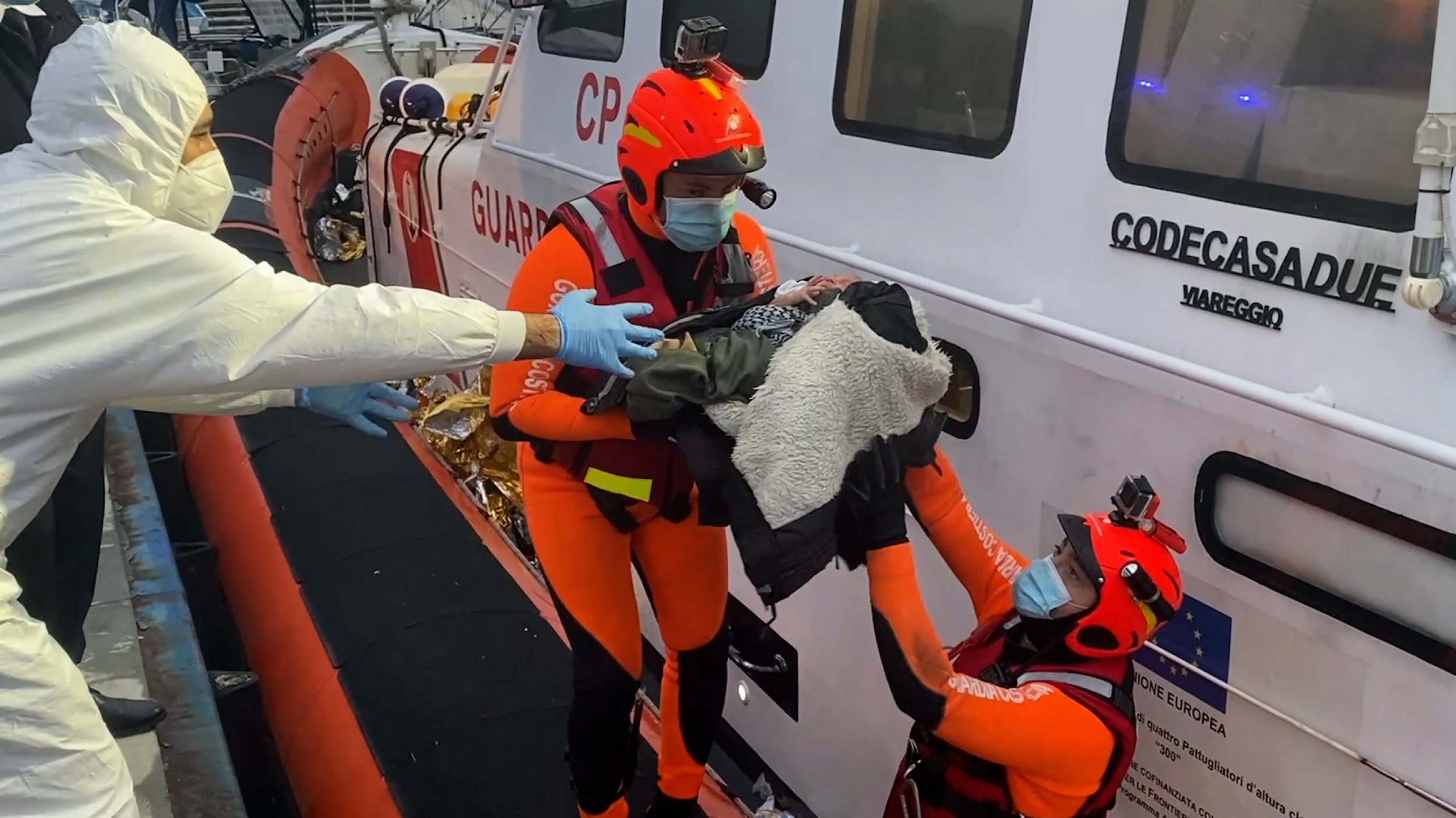 Italian Coast Guard Rescues New Born Baby On Board Tightly-Packed Boat Of Migrants