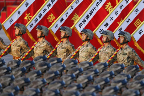 Soldiers in the PLA of China take part in a military parade. 