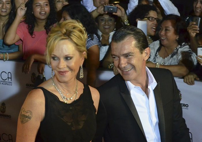 Antonio Banderas and Melanie Griffith (L)