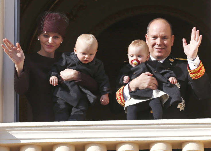 Prince Albert II of Monaco and his wife Princess Charlene hold their twins Prince Jacques and Princess Gabriella 