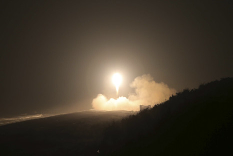 A rocket takes off from a North Korean launch site.