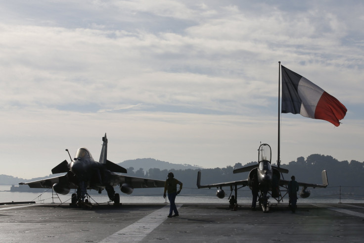 Two Rafale fighter jets on the deck of the French aircraft carrier Charles de Gaulle 