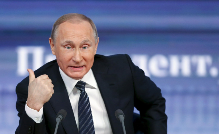 Russian president Vladimir Putin addresses journalists at a Moscow conference 