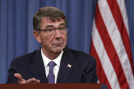 Pentagon chief Ash Carter gestures during a press conference