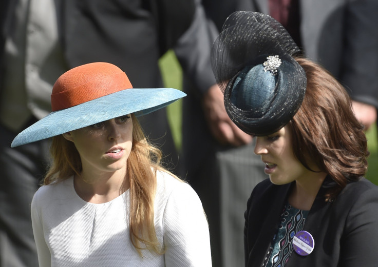 Britain's Princess Beatrice (L) and her sister Princess Eugenie