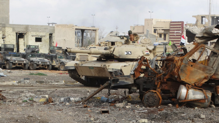 An Iraqi tank rolls through Ramadi