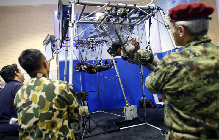 Soldiers use a parachute simulator 