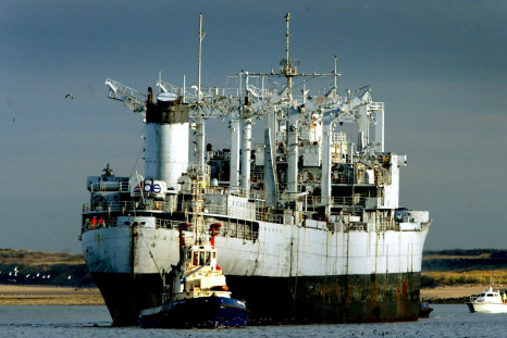 An old U.S. Navy ship is towed to the U.K.