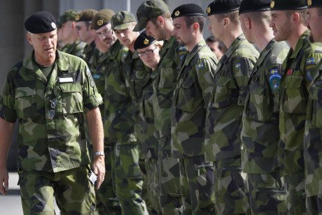 Swedish soldiers line up during a drill. 