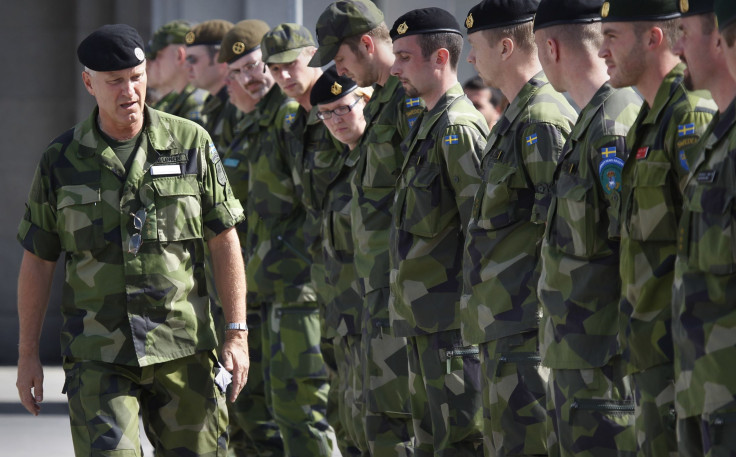 Swedish soldiers line up during a drill. 