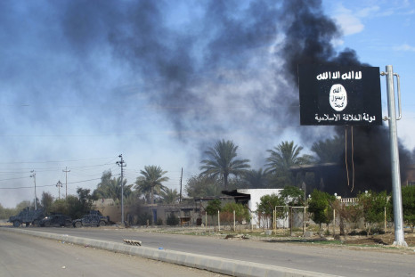 An ISIS flag near a road in Iraq. 