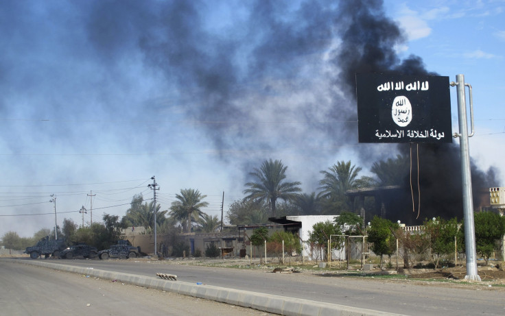 An ISIS flag near a road in Iraq. 