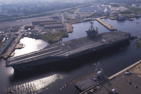The USS Harry Truman leaves the Norfolk Naval Shipyard in Virginia. 