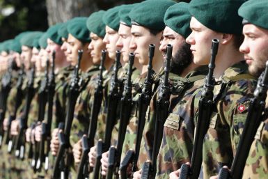 Swiss soldiers form an honor guard during a ceremony in Bern, Switzerland. 