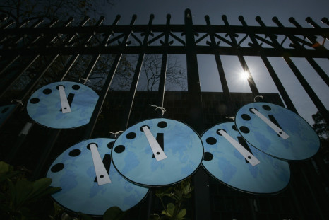 Doomsday clocks on a gate in Hong Kong.