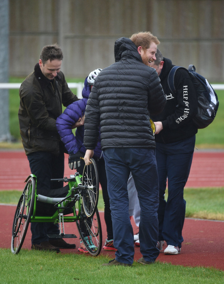 Prince Harry Helps A Fallen Woman