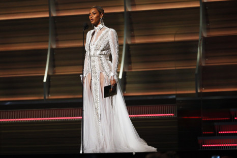 Beyonce presents the Best Record of the Year award during the 58th Grammy Awards 
