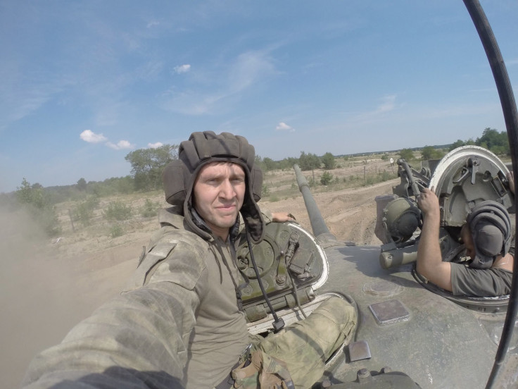Ivan Rodichenko during on the top of a Ukrainian military tank during the battle for East Ukraine.