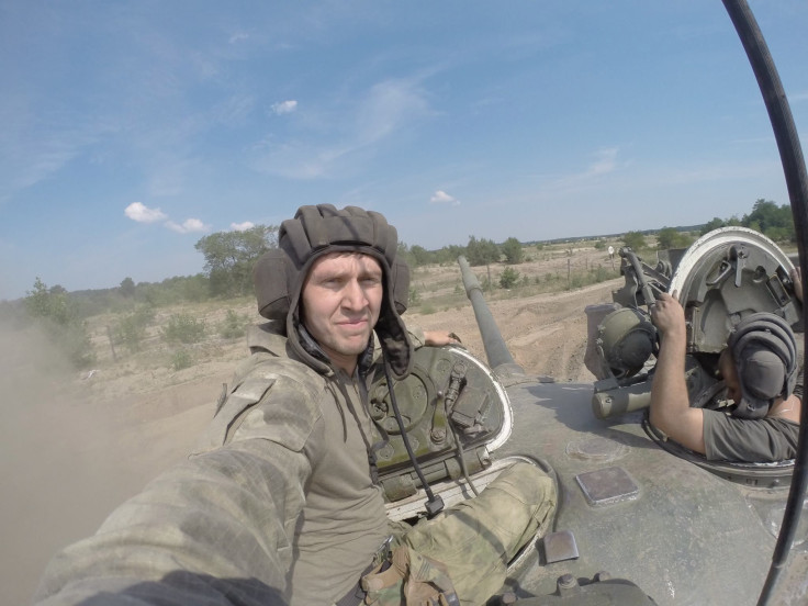 Ivan Rodichenko during on the top of a Ukrainian military tank during the battle for East Ukraine.