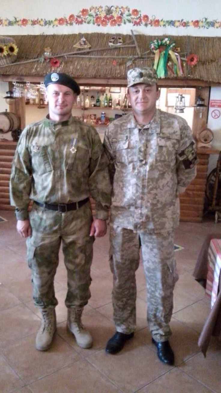 Alexey Litvinenko standing next to an unknown and high ranking Ukrainian officer.