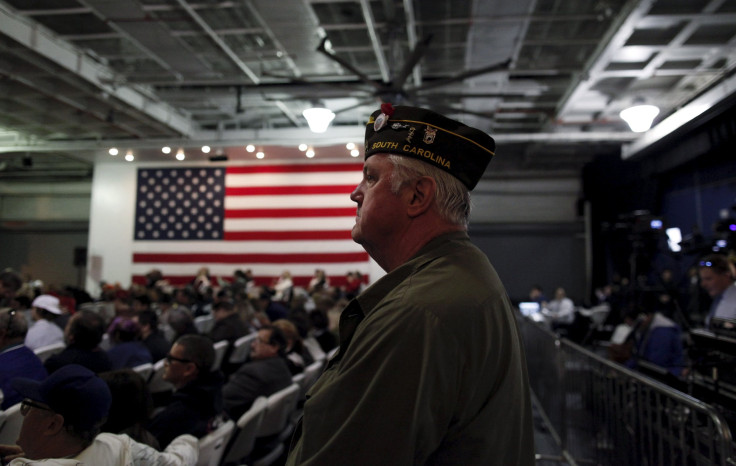 A veteran waits for Donald Trump to speak at a rally in South Carolina. 