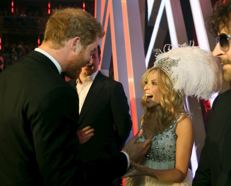 Britain's Prince Harry greets Kylie Minogue 