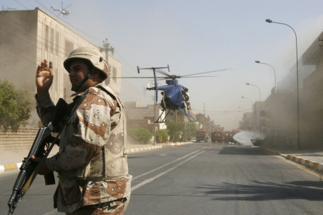 A private contractor group's helicopter prepares to land in Baghdad, Iraq. 