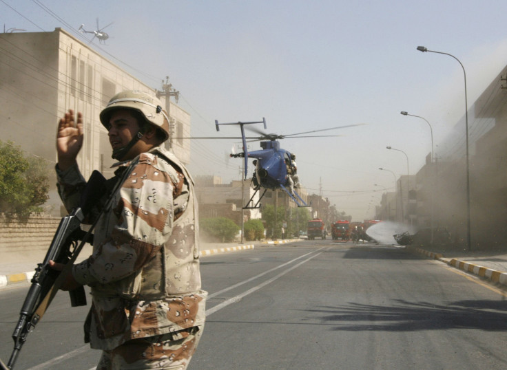 A private contractor group's helicopter prepares to land in Baghdad, Iraq. 