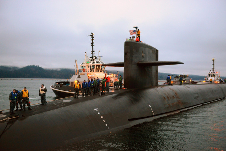 A nuclear submarine prepares for docking at its base in Washington. 