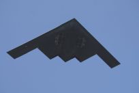 A B-2 Spirit bomber flies over the 95th Rose Bowl game. 