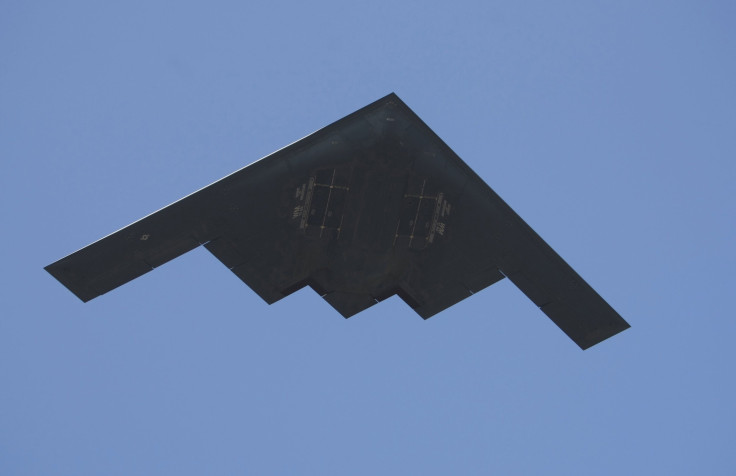 A B-2 Spirit bomber flies over the 95th Rose Bowl game. 