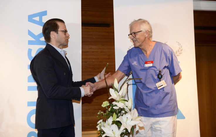 Sweden's Prince Daniel shakes hands with doctor Lennart Nordstrom