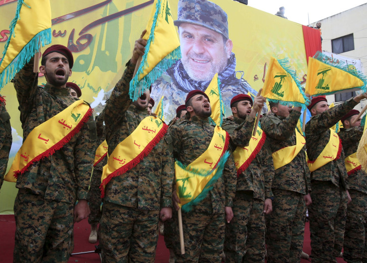 Hezbollah members chant during a funeral in Lebanon.