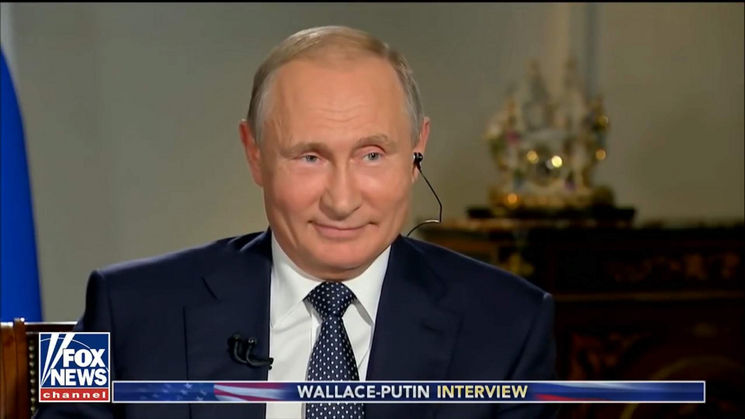 Putin Refuses To Hold Indictment Document During Fox Interview