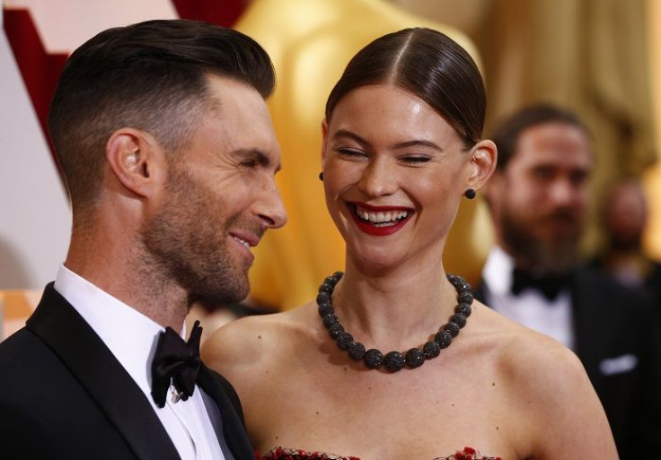 Adam Levine and wife Behati Prinslo