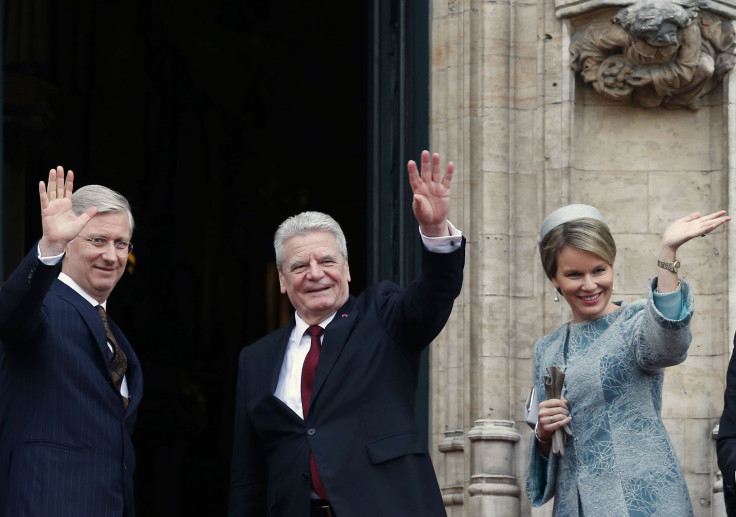 Belgium's King Philippe (L) and Queen Mathilde with German President Joachim Gauck